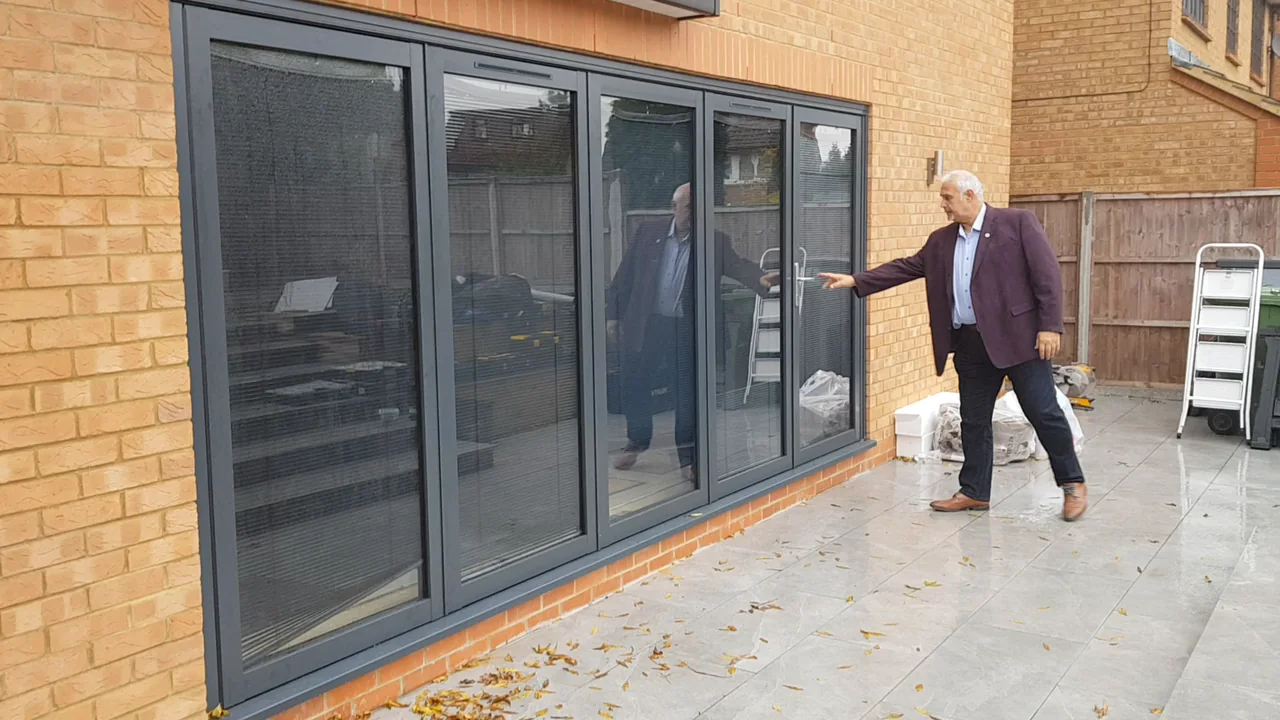 Glazed panels bring daylight into the room when closed.